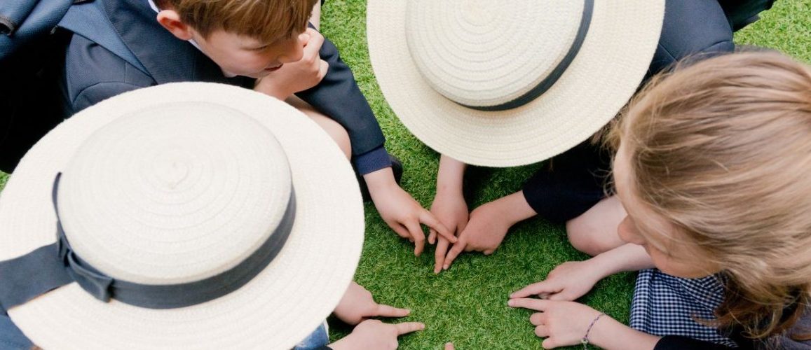 Children playing a game with their fingers