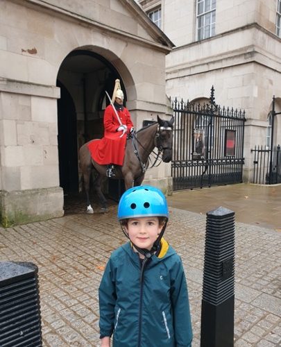 little boy wearing a helmet