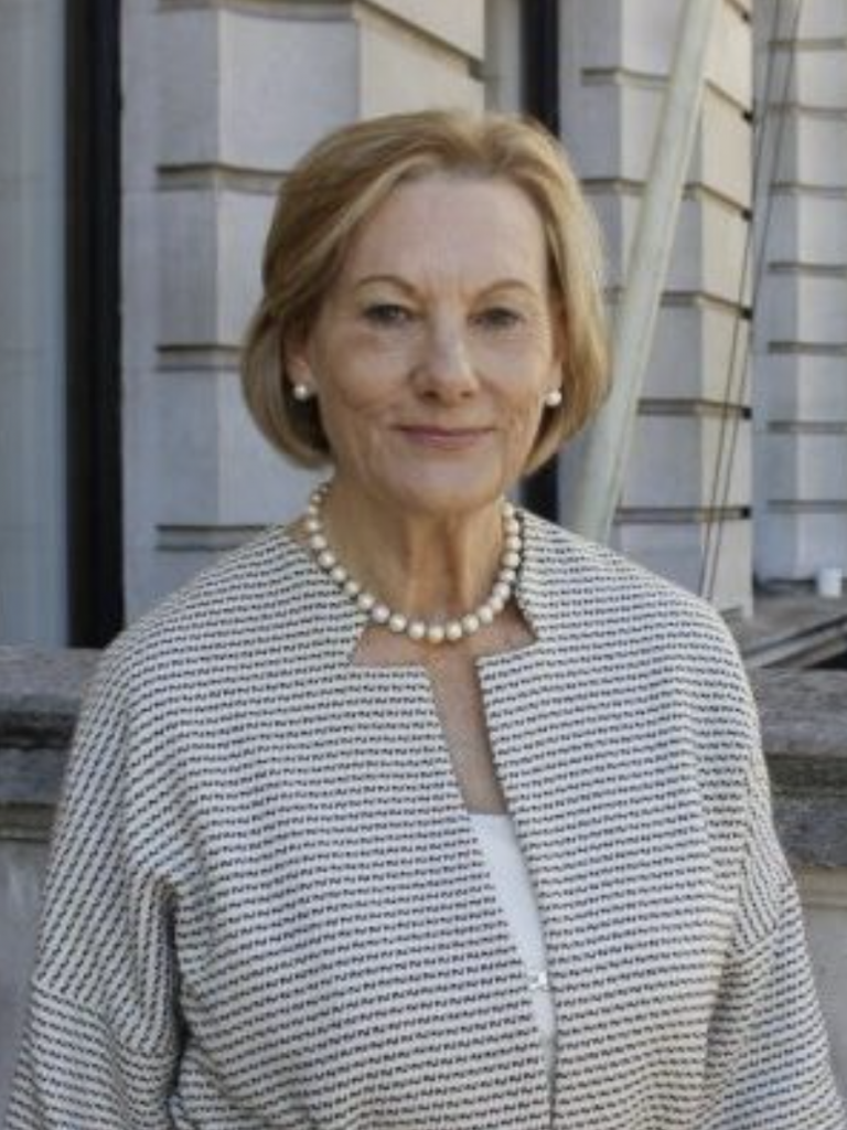 A teacher smiling for the camera