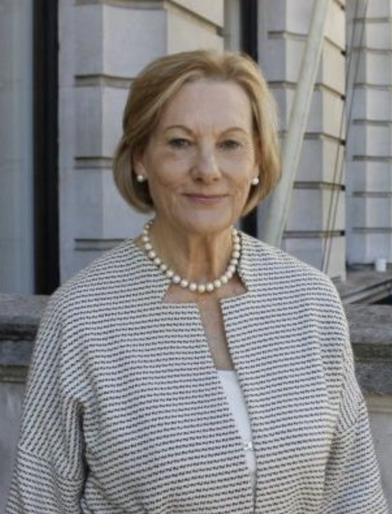 A teacher smiling for the camera