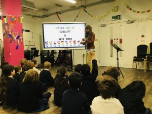 Mrs Rawn speaking in assembly to a group of pupils