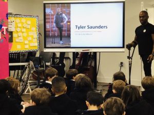 Tyler Saunders giving an assembly
