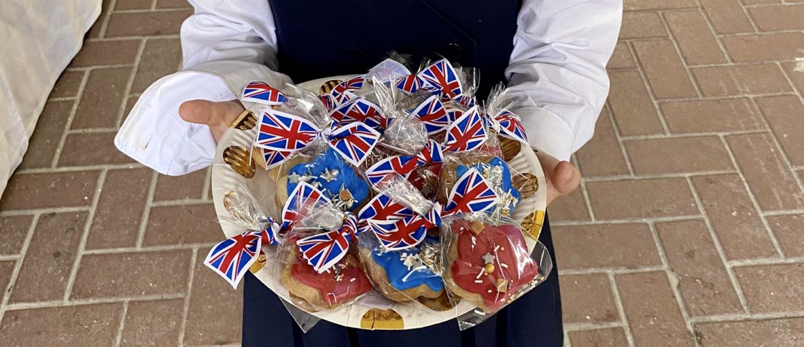 child holding her selection of biscuits