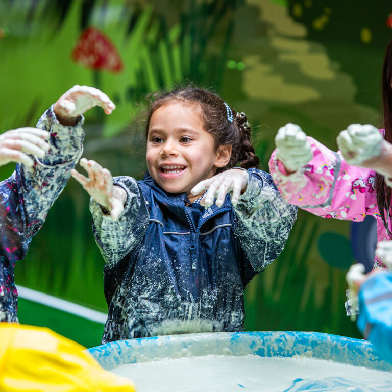 students in messy play