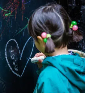 student using chalk