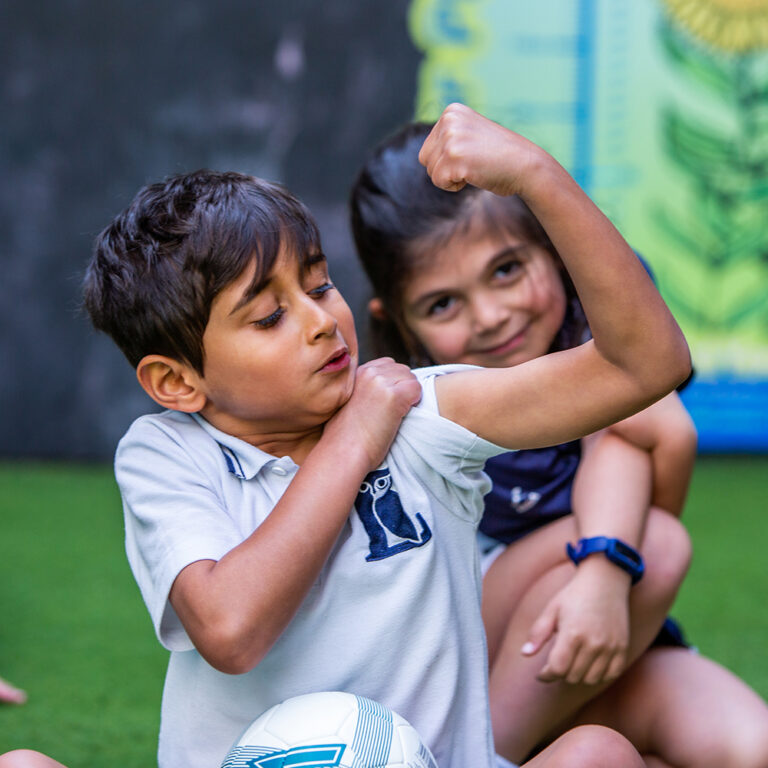 boy showing his arm