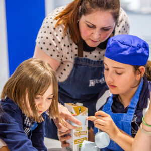 students measuring ingredients
