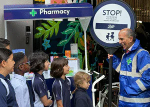 The Lyceum kids are talking to the Boots pharmacist during Pharmacist First campaign shoot