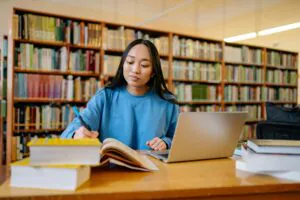 A young student applying for scholarships in the UK